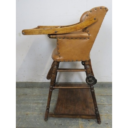 713 - C1900 Child's metamorphic high chair with a tan leatherette upholstered seat over turned legs.  H93c... 