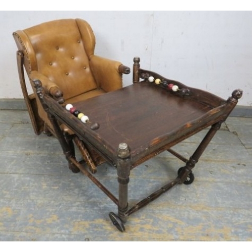 713 - C1900 Child's metamorphic high chair with a tan leatherette upholstered seat over turned legs.  H93c... 