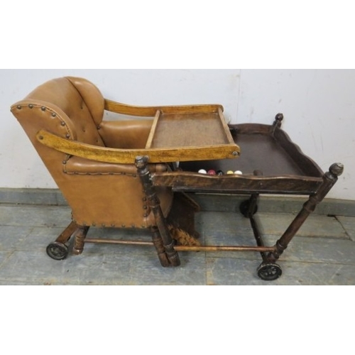 713 - C1900 Child's metamorphic high chair with a tan leatherette upholstered seat over turned legs.  H93c... 