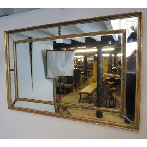 737 - A gilt Regency mirror with five pieces of mirror separated with carved mouldings.  
Condition report... 