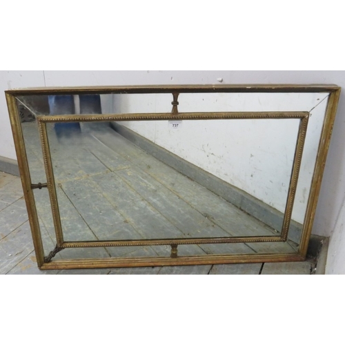 737 - A gilt Regency mirror with five pieces of mirror separated with carved mouldings.  
Condition report... 