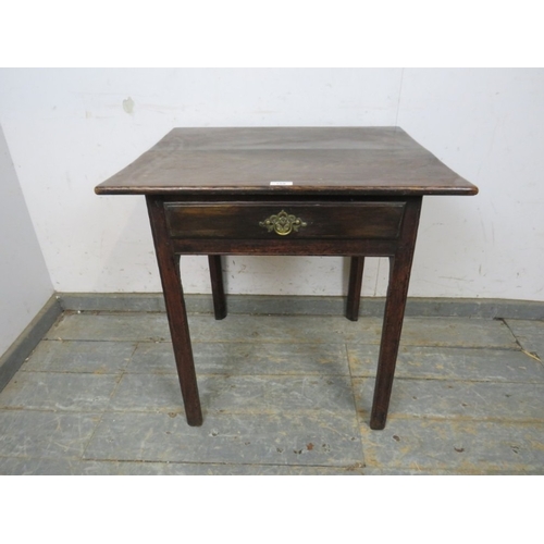 778 - A 19th Century oak side table with a single drawer, brass handle and square chamfered legs.  H66cm x... 