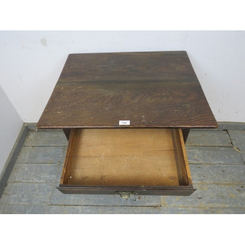 778 - A 19th Century oak side table with a single drawer, brass handle and square chamfered legs.  H66cm x... 