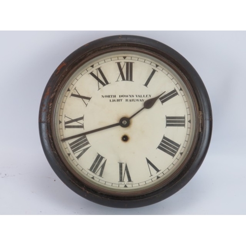 178 - An antique wall clock. With later added ‘North Downs Valley Light Railway’ inscription applied as pa... 