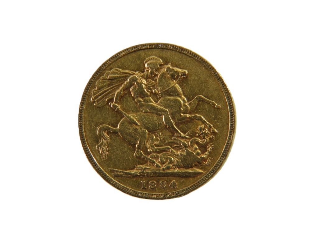 An 1884 Queen Victoria young head gold full sovereign coin.