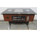 A C1980's shuttle invader cocktail table arcade machine, a clone of the ...
