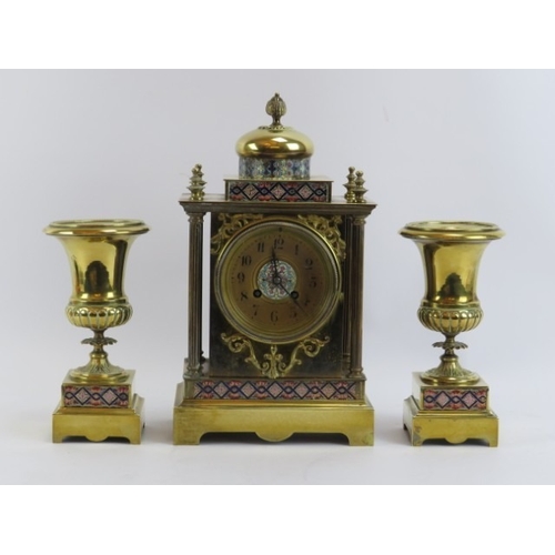 154 - A French gilt brass cloisonné decorated striking clock garniture, late 19th/early 20th century. (3 i... 