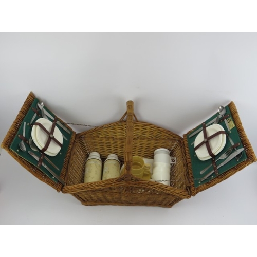 169 - A vintage Optima wicker picnic hamper with contents. 42 cm height.
Condition report: Light age relat... 