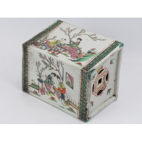 24 - A large Chinese famille verte decorated porcelain pillow, early 20th century. Depicting figures in a... 