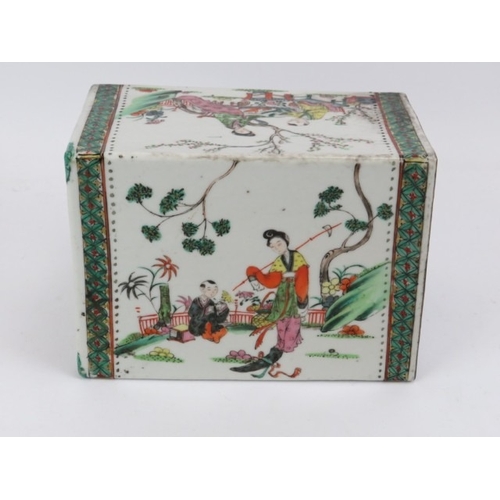 24 - A large Chinese famille verte decorated porcelain pillow, early 20th century. Depicting figures in a... 