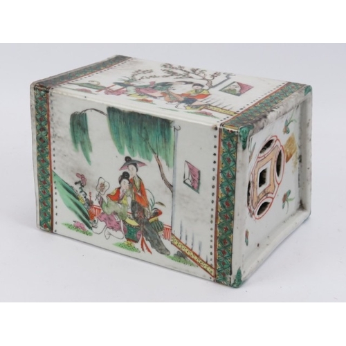 24 - A large Chinese famille verte decorated porcelain pillow, early 20th century. Depicting figures in a... 