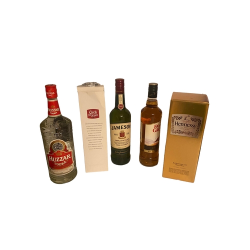 251 - 5 Bottles of Cork Dry Gin, Hozzar Vodka, Famous Grouse, Jamieson and Hennessy Cognac