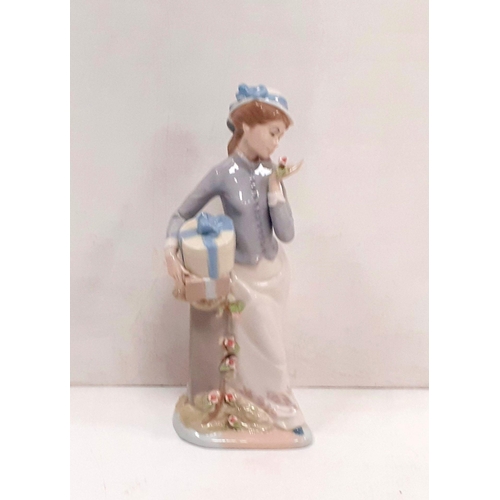 52 - Porcelain Figure of  a Lady
32cm H