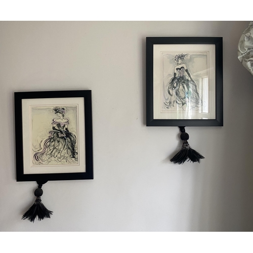 42 - Pair of Black Framed Fashion Prints