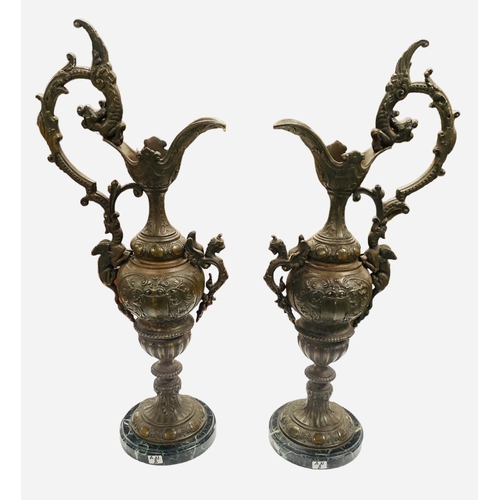 411 - Pair of 19C French Spelter Ewers with Bronze Patina on Black Marble Bases.
50cm H