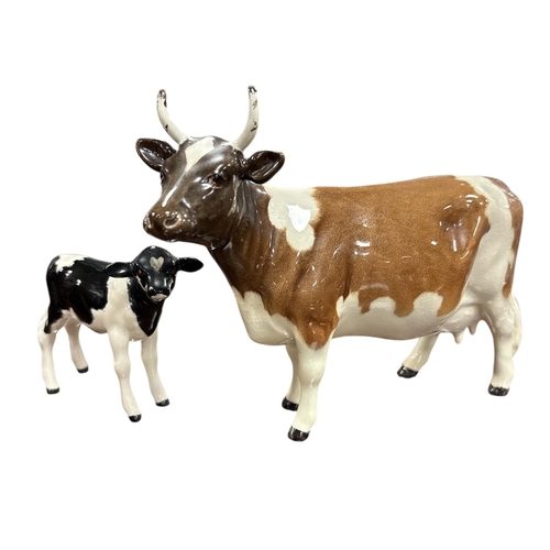 273 - Beswick Guernsey Cow &Friesian Calf
