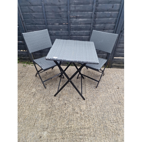 497 - Folding garden table and chairs