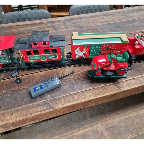 403 - Electric North Pole Express Christmas train set lots of track  engines and carriages