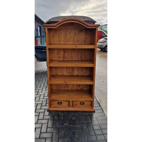 295 - Solid pine bookcase with drawer