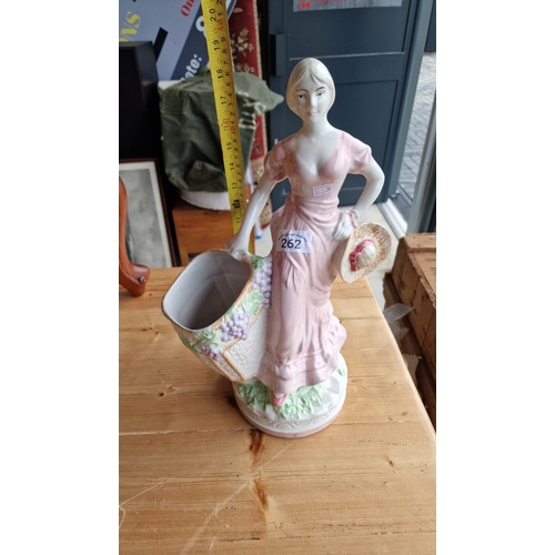 262 - Large porcelain wine maiden