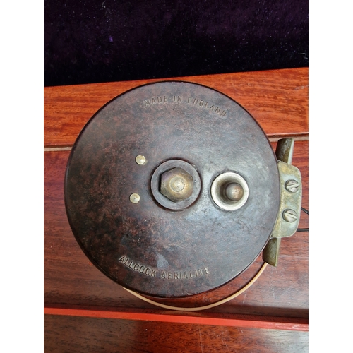 17 - Vintage fishing reel by Allcock