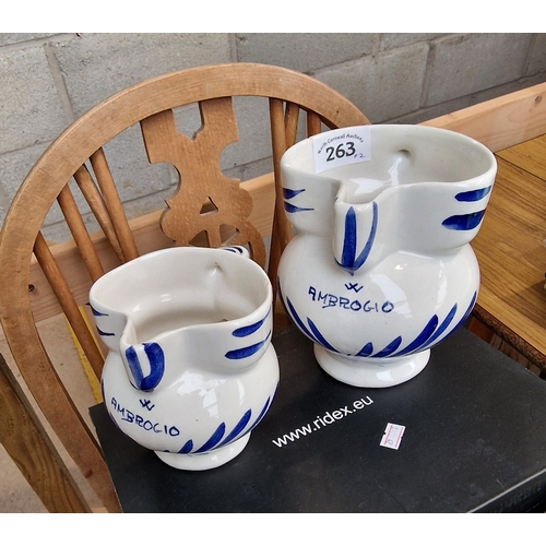 263 - Blue and white jugs