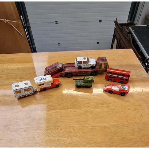 302 - 8 Die cast cars assorted