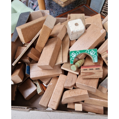 384 - Box of wooden building blocks