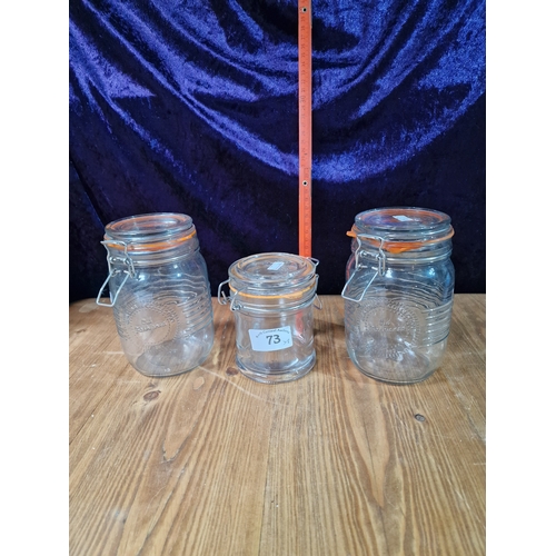 73 - 3 glass storage jars