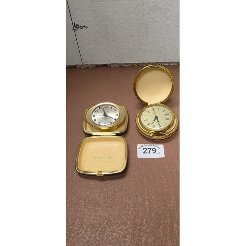 279 - 2 Vintage Travel Clocks