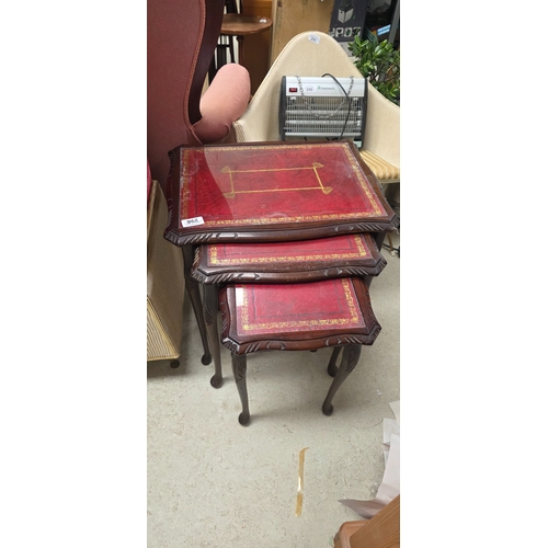 298 - Red Leather Topped Nest of Table
