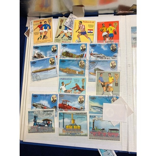 2 - Tin of International Stamps with Collectors Book