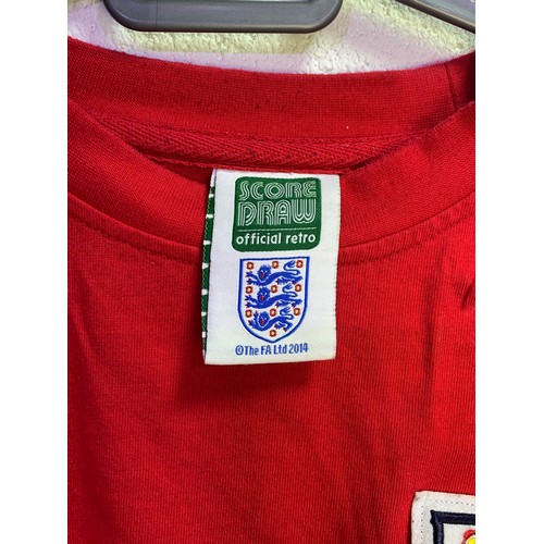 69 - Official Retro Style No.6 Bobby Moore England Football Top by Score Draw