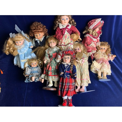 398 - Nine Collectable Porcelain Dolls