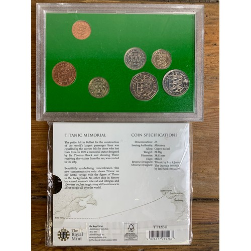 9 - Late 70's early 80's uncirculated Guernsey Coinage and Titanic £5 coin - GA29441