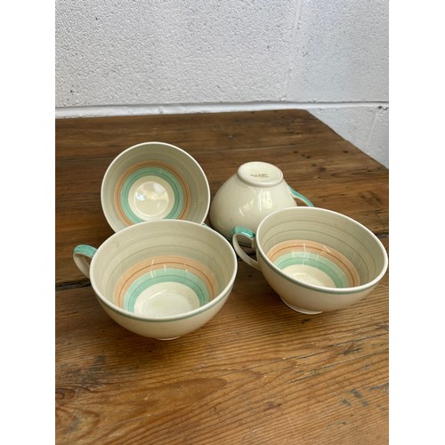 303 - Four Susie Cooper Tea Cups