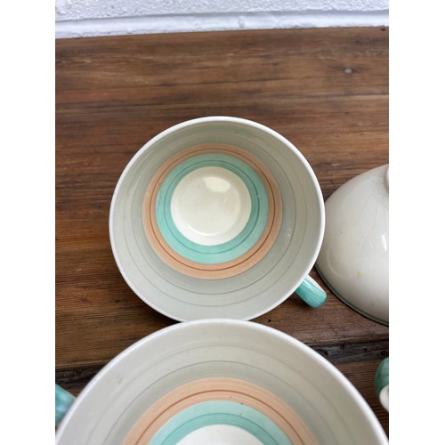 303 - Four Susie Cooper Tea Cups