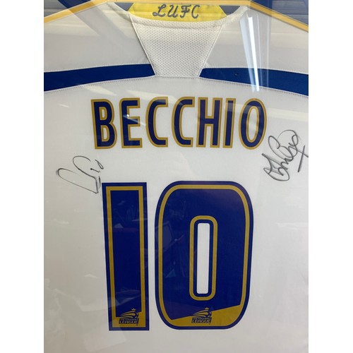 34 - Luciano Becchio Leeds United Shirt with hand signed autograph from Becchio and one other