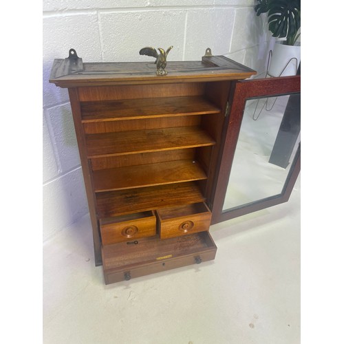 126 - Wall Mounted Display Cabinet With Drawers & Brass Eagle Detail