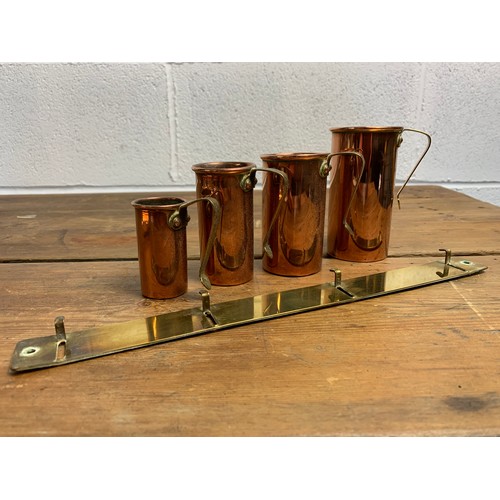 313 - Antique Copper Measuring Cup Set