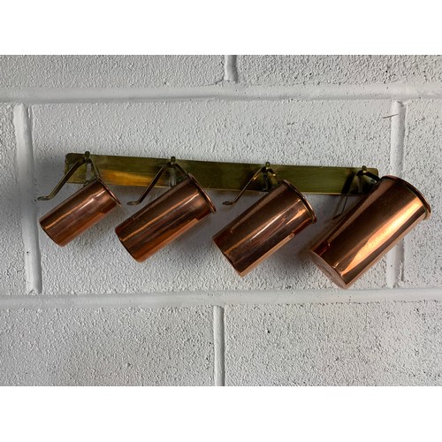 313 - Antique Copper Measuring Cup Set