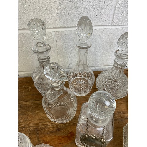 186 - Collection of 10 Vintage decanters of varying age