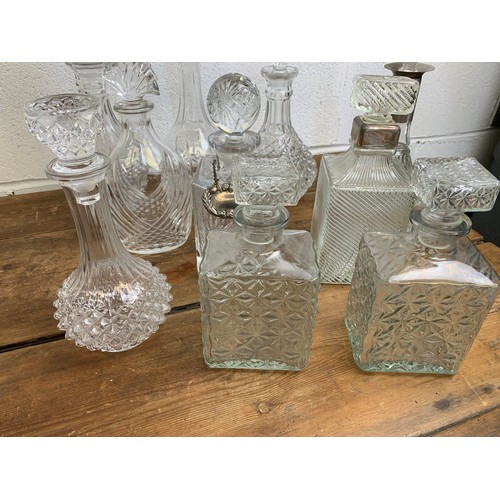 186 - Collection of 10 Vintage decanters of varying age