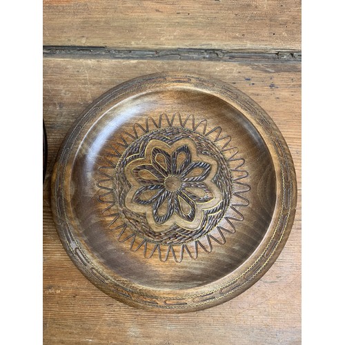 538 - Ornate, carved wooden plates with brass inlayed