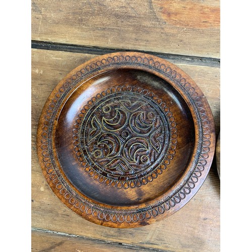 538 - Ornate, carved wooden plates with brass inlayed