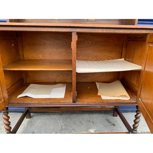 100A - Jacobean Revival Oak Dresser with carvings and barley twist legs - 105 x 46 x 194cm