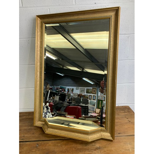 531 - Beveled edge mirror set in gold frame with mirrored ledge - 63 x 90cm