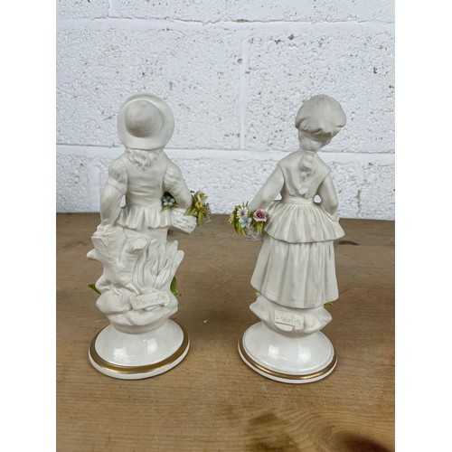 128 - Two Capodimonte Marcolin Bisque Figures