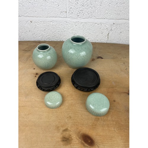 35 - Two Vintage Celadon Lidded Ginger Spice Jars With Wooden Stands