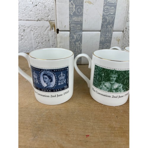 301 - Four Royal Mail Coronation Mugs by Gilchrist and King